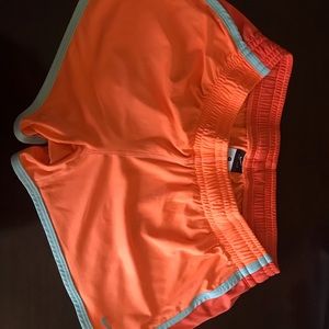 Nike dri fit orange shorts